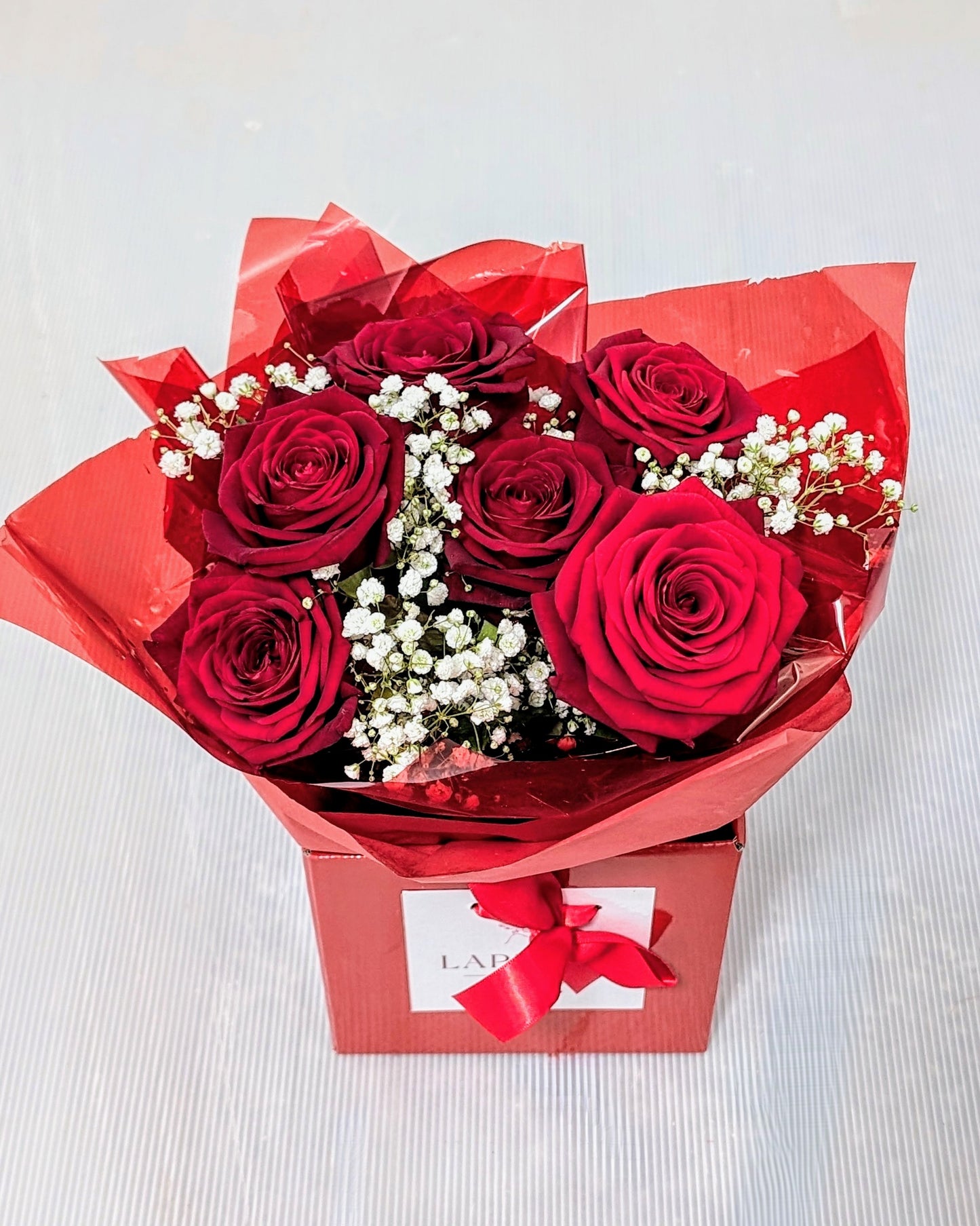 Petite flower box red roses and Gypsophila