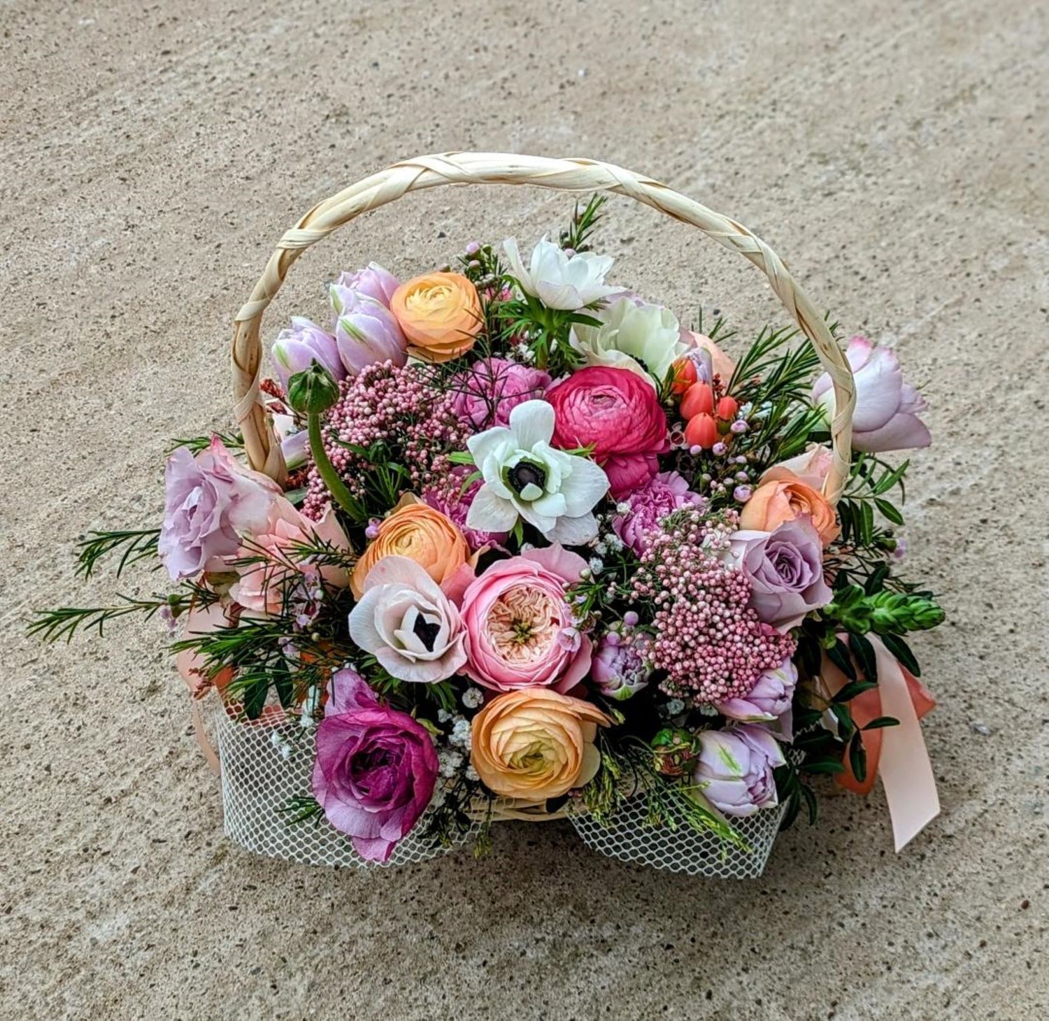 Flower basket spring flowers anemones tulips ranunculus