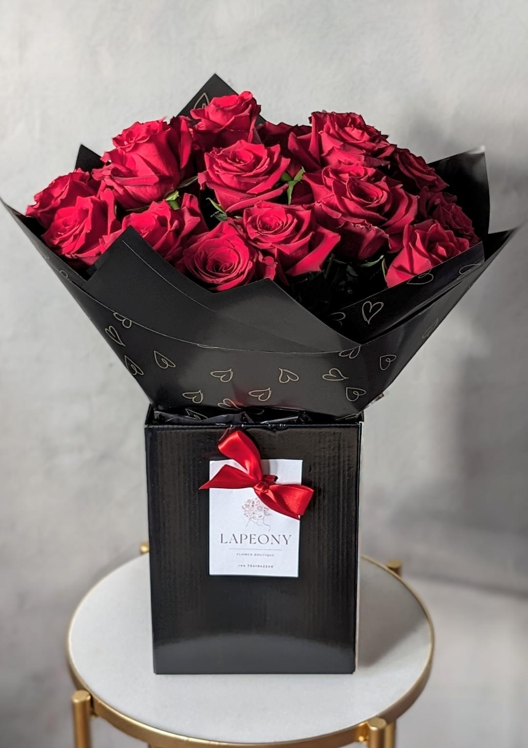 Eternal Elegance: Classic Red Roses in Luxury Black Packaging