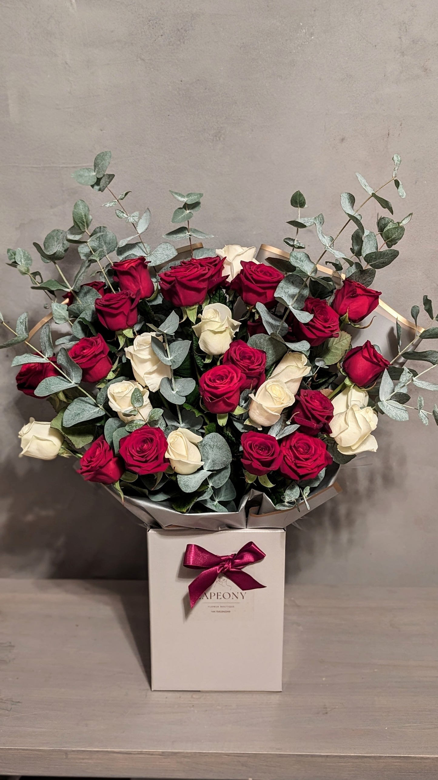 Crimson Flame: Premium Red and White Rose Face Fronting Bouquet