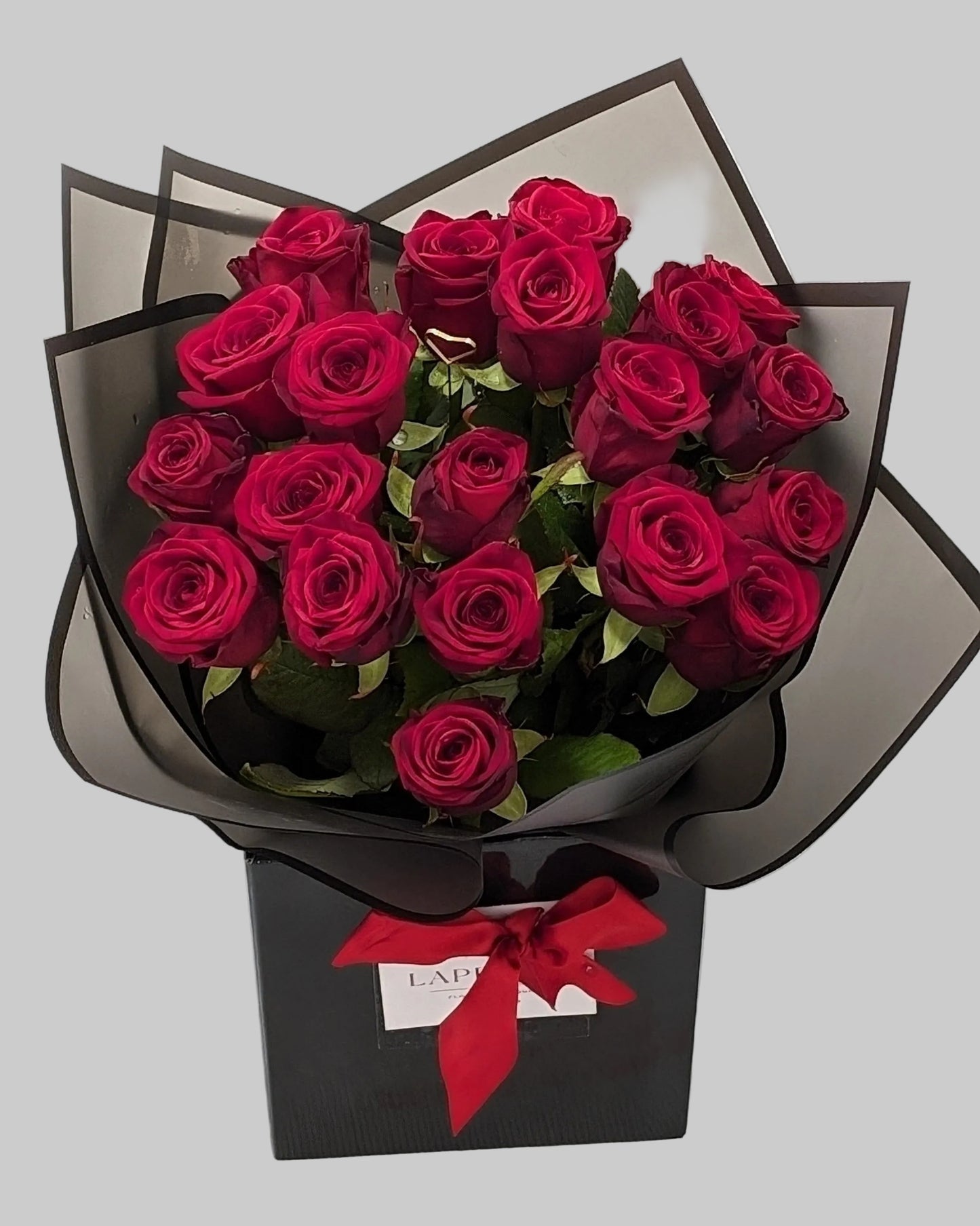 Premium Red Roses in Luxury Black Packaging