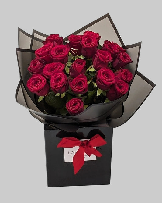 Premium Red Roses in Luxury Black Packaging