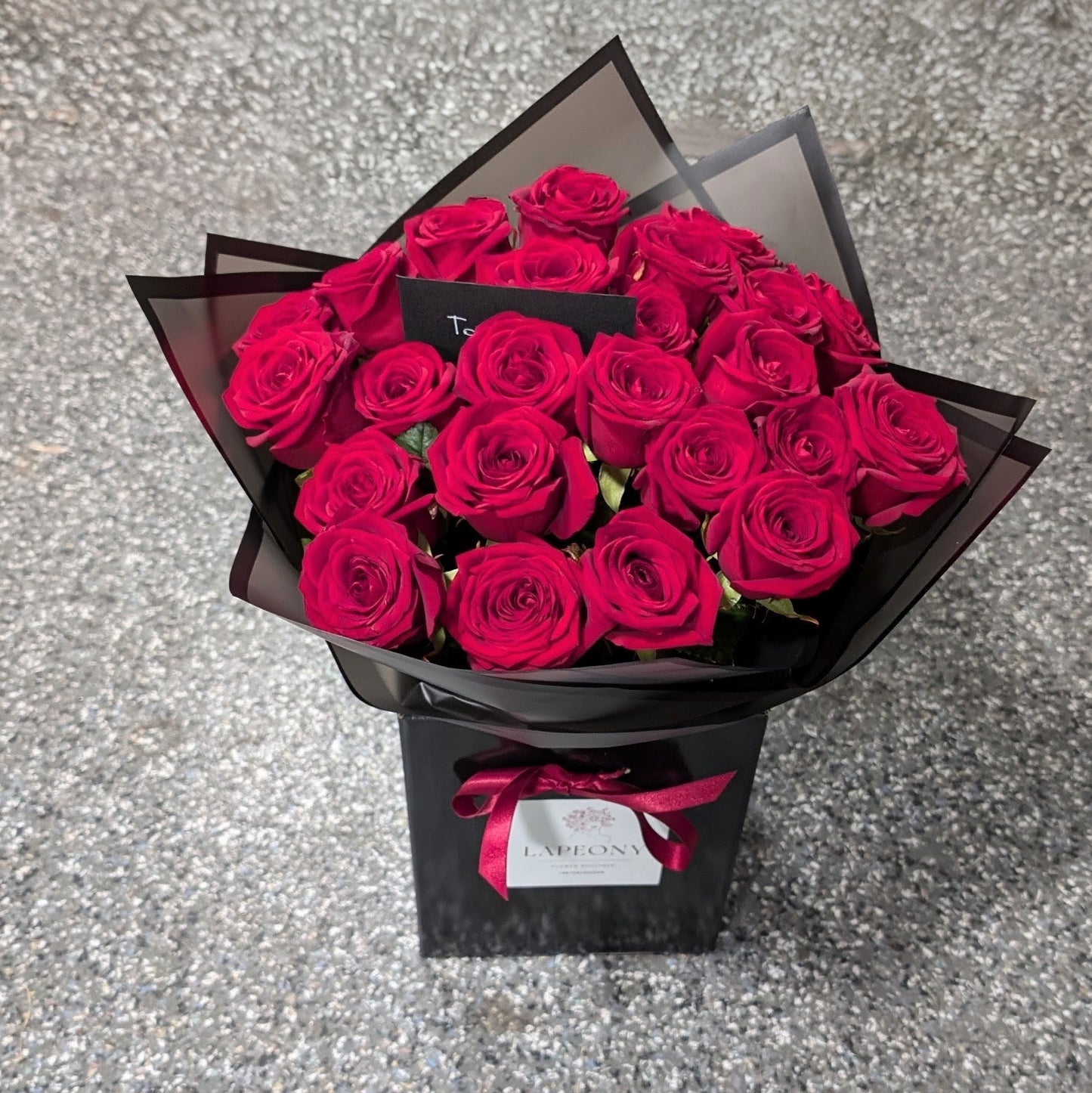 Premium Red Roses in Luxury Black Packaging
