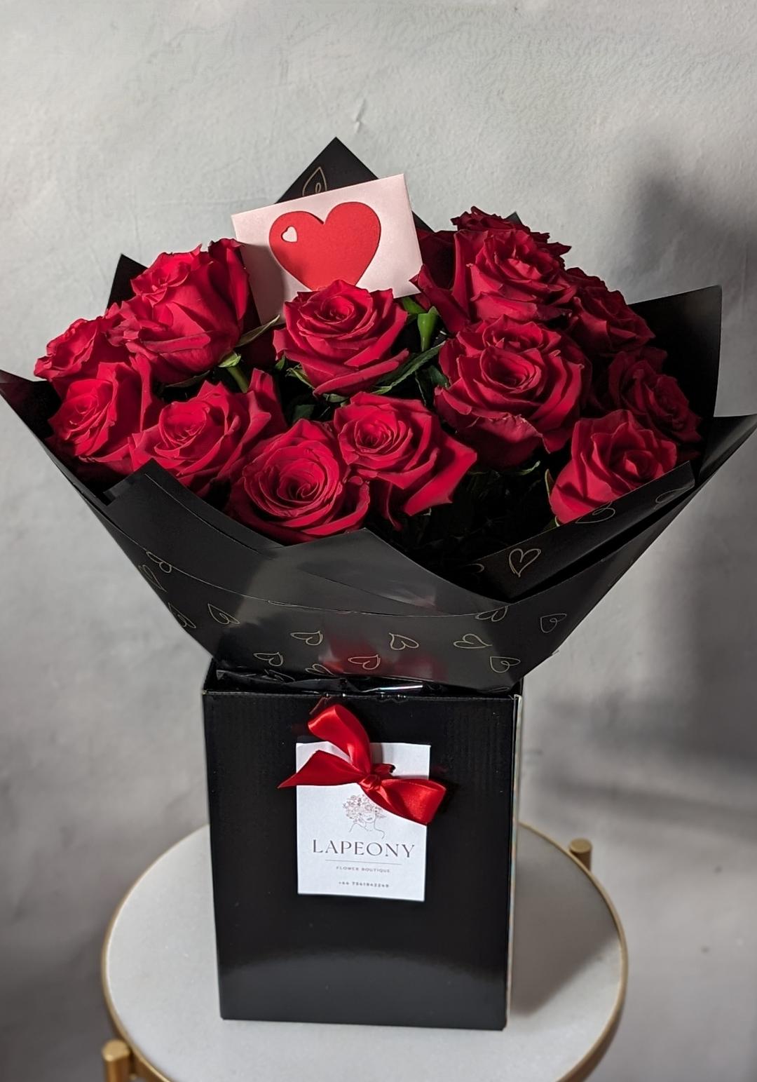 Eternal Elegance: Classic Red Roses in Luxury Black Packaging